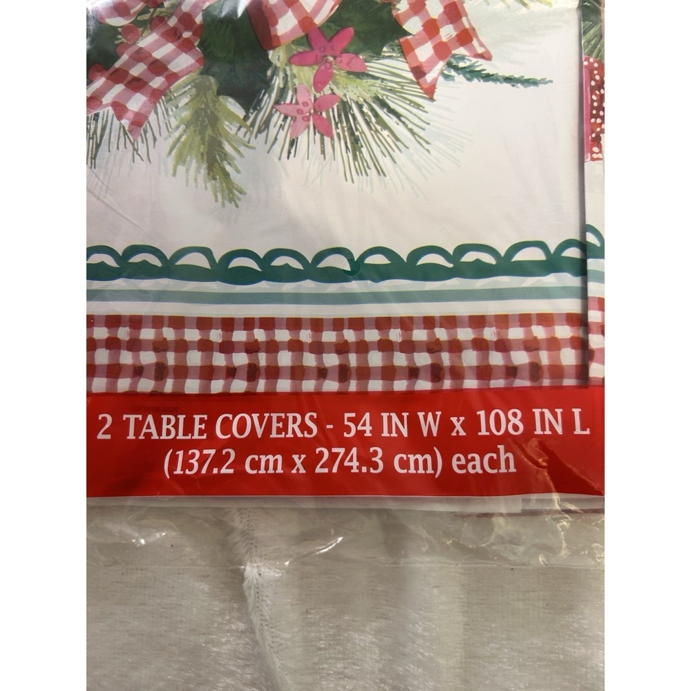The Pioneer Woman Ribbons & Bows Christmas Plastic Table Covers 54x108 4 Count - Picture 2 of 3